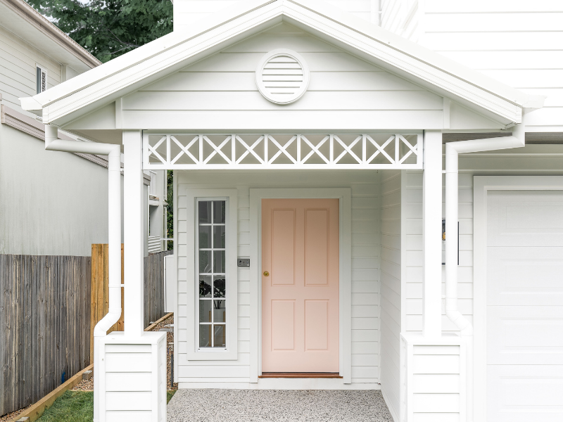 White Hamptons Inspired Home with Pink Front Door